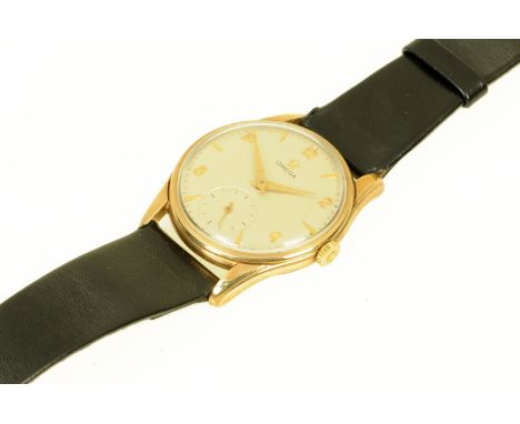 A vintage Omega gentleman's wristwatch, manual, with 9 ct gold case inscribed verso "Presented to A.I. Davies by F.W. Woolwor