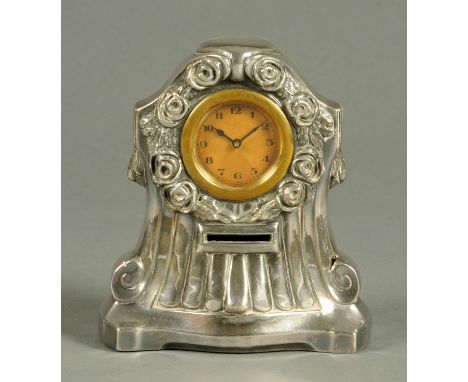 A late 19th/early 20th century silver plated mantle clock money box.  Height 17 cm. 