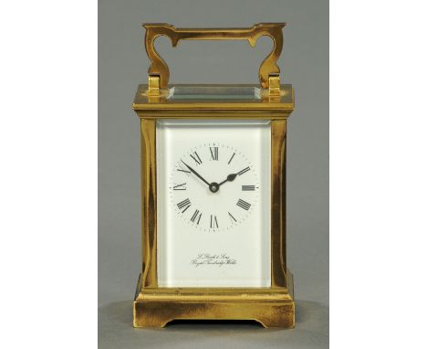 A carriage clock, by L. Reich & Sons, Tunbridge Wells, modern.  Height excluding carrying handle 11.5 cm. 