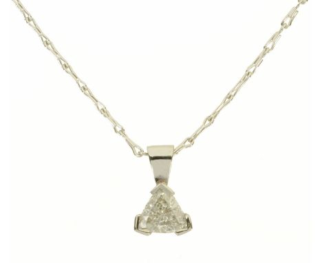 An 18 ct white gold pendant on chain, set with a trilliant cut diamond weighing +/- .72 carats.  
