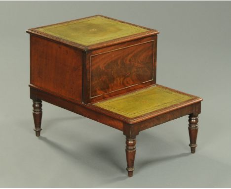 A late George III mahogany library step, with green tooled leather treads and raised on short turned legs.  Width 43 cm, leng