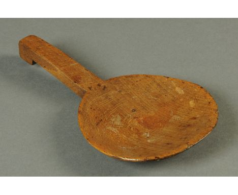 A small 19th century beechwood ladle.  Length 24 cm.    CONDITION REPORT:  Generally very good condition with no damage, repa