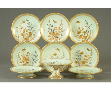 A Worcester dessert service, with turquoise ground and comprising comport, 2 serving dishes and 6 plates. Largest diameter 24