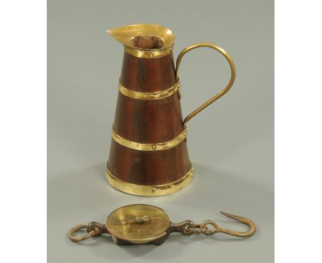 A brass bound coopered jug, with loop handle, height 36.5 cm, and a Salters Class 3 spring balance to weigh 200 lbs.   CONDIT