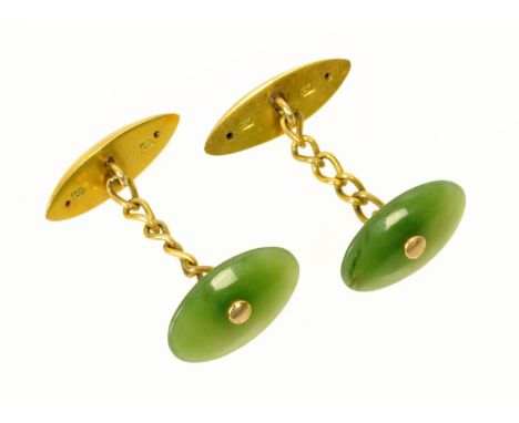 A pair of jade and 9 ct gold cufflinks.   CONDITION REPORT:  The cufflinks are in generally good condition. The links appear 