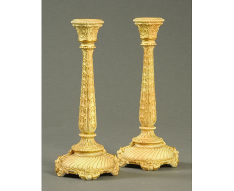 A pair of Royal Worcester candlesticks, puce printed mark and Registration No. 227597 and 1765.  Height 27 cm (see illustrati