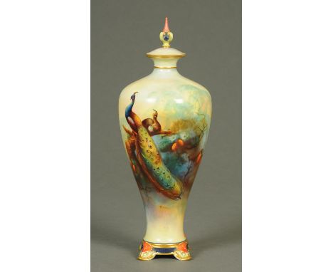 A Royal Worcester vase, decorated with a peacock and signed "C. White".  Height 30 cm (see illustration).   CONDITION REPORT: