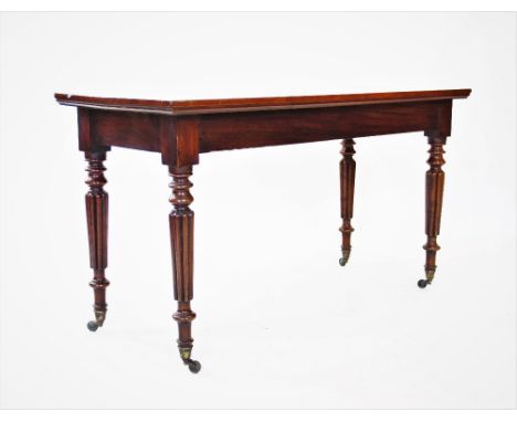 A 19th century mahogany side table, the rectangular top raised upon lobed and ring turned legs with brass shoes and castors, 