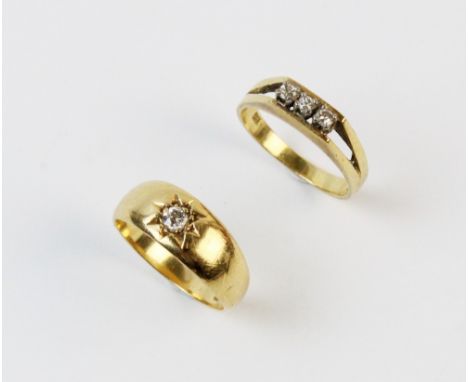 An diamond set 18ct gold band, the old cut diamond claw set to a plain polished yellow gold band, ring size L, together with 