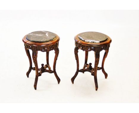 A pair of Japanese influence marble top urn / lamp stands, 20th century, the circular marble tops raised upon stained beech w