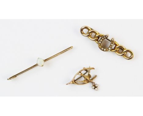 A Victorian wishbone and swallow brooch, suspending a small dropper set with seed pearls, 2.7cm x 1.3cm, simple hinged pin an