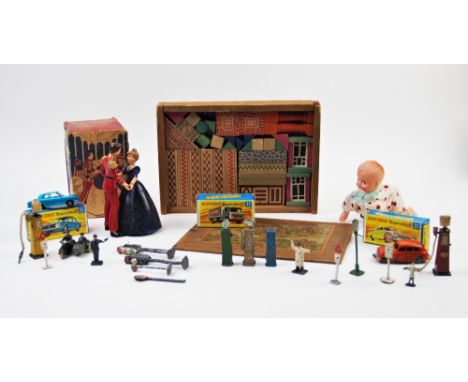 A collection of vintage painted metal model figures and road signs, to include five various petrol pumps, traffic lights, roa