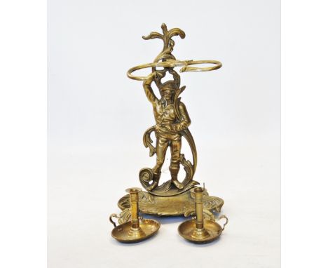 A Victorian style figural brass stick stand, cast in the form of a buccaneer, above a swept oval tray on scroll feet, 60cm H,