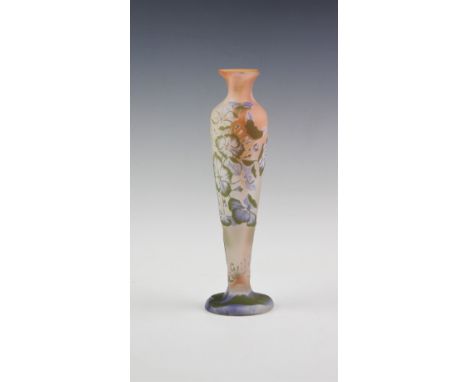 An early 20th Century cameo glass vase signed 'Galle', the inverted baluster vase cased in pale lilac, green and opal, over a