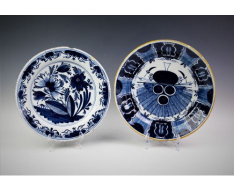 A late 17th/ early 18th century Dutch Delft Ware Three Bells (Die Drie Klokken) plate, decorated with a Peacock design, after