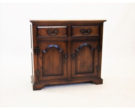 A George III style stained ash dresser base by Sitting Firm, late 20th century, the rectangular moulded top above two frieze 