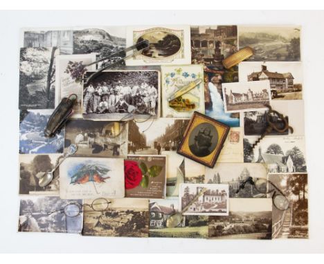 A collection of early 20th century postcards, to include topographical interest, along with assorted pen knives and corkscrew