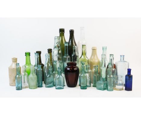 A collection of vintage glass bottles, to include stoneware examples, 'Virol' brown glass jar, Marstons, Drew &amp; Co, other