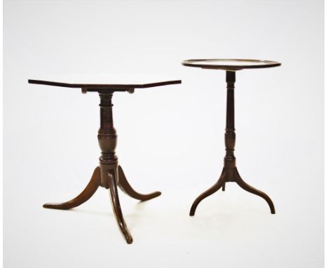 A George III mahogany wine or lamp table, the circular tray top raised upon a ring turned shaft with three slender down swept