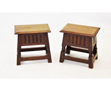 A pair of 17th century style hinged oak joint stools, 20th century, each with a rectangular hinged cover, raised on bobbin tu