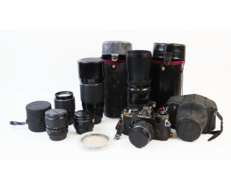 A Pentax KM single lens reflex camera body with Pentax f1.8 55mm lens, a Pentax K2 single lens reflex camera body with Pentax