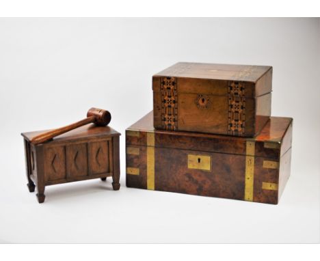 A Victorian burr walnut stationery box, applied with brass embellishments and banding, enclosing a leather writing slope, 16c
