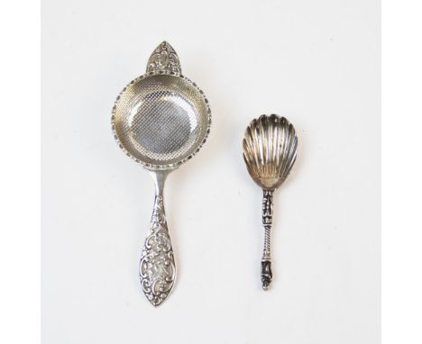 A silver tea strainer, J B Chatterley &amp; Sons Ltd, Birmingham 1966, pierced bowl with foliate scroll motifs, 15.5cm long, 