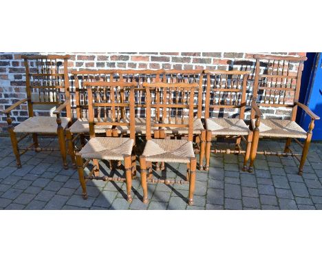 8 (inc. 2 carvers) reproduction 18th century ladder back oak dining chairs with rush seats&nbsp;