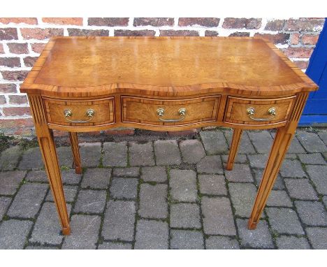 Burr walnut veneered console table / writing table with cross banding