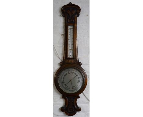 Early 20th century carved aneroid barometer