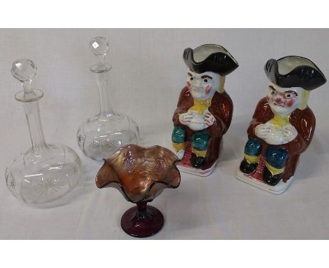 2 shaft and globe decanters, a large pair of Toby Jugs and a Carnival glass bowl