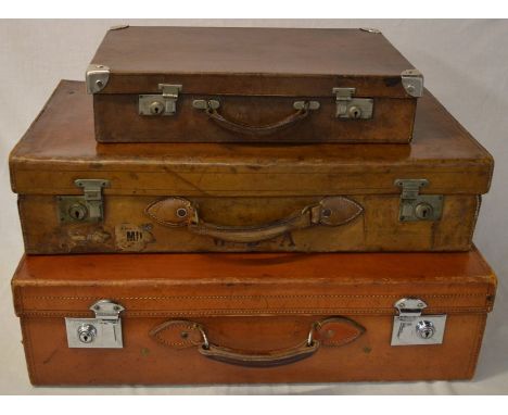 3 vintage leather suitcases