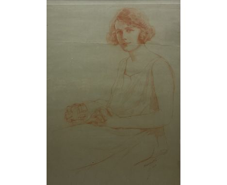 Samuel Warburton RMS (British 1874-1938): Portrait of a Seated Lady, sanguine chalk and pastel signed and dated 1923, 70cm x 