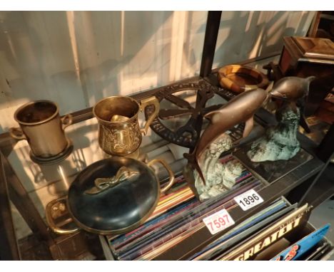 Shelf of mixed metal items 