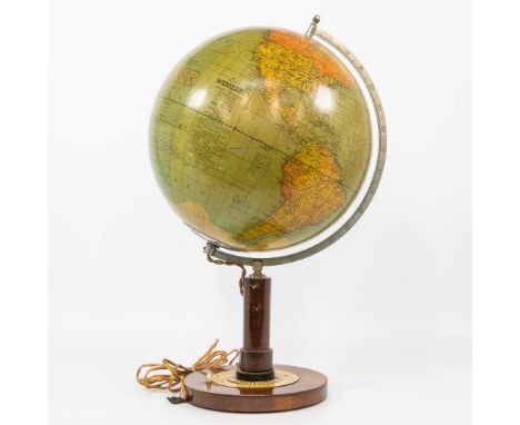 A globe made of glass on a wood base, for trade, industry, shipping and science. Published by 'De Dag' in Antwerp, Belgium. (