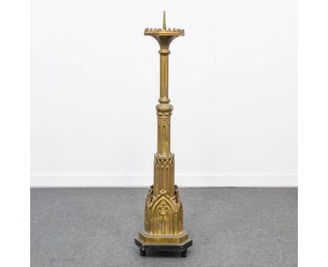 A large Church candlestick in neogothic style, made of brass. The first half of the 20th century. (26 x 26 x 120 cm)