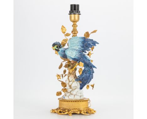 A table lamp with porcelain bird on a metal stand, marked with a Svres porcelain mark. The second half of the 20th century. (