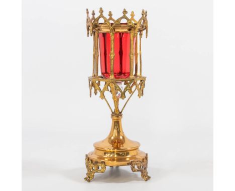 An eternal light in Neogothic style with red glass, made of brass. 19th century. (28 x 11 cm)