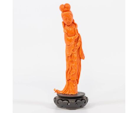 A Chinese red coral sculptured statue of a lady, around 1980. (7 x 14 x 19 cm)