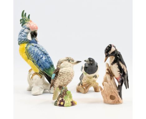 A collection of 4 porcelain birds, made by Goebel, Capodimonte, and Beswick (2). The second half of the 20th century. (11,5 x