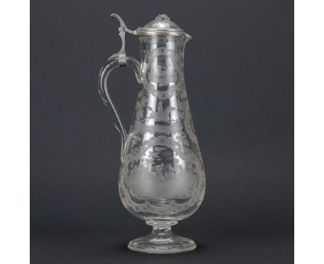 An antique pitcher made of Boheme glass with etched decor and finished with a lid made of tin. 19th century. (28 x 11 cm)