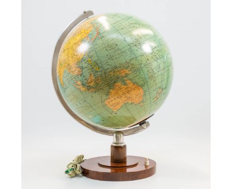 A glass globe on wood base, marked SVH Staatskunde Globe and written in Dutch. Middle of the 20th century. (48 x 34 cm)