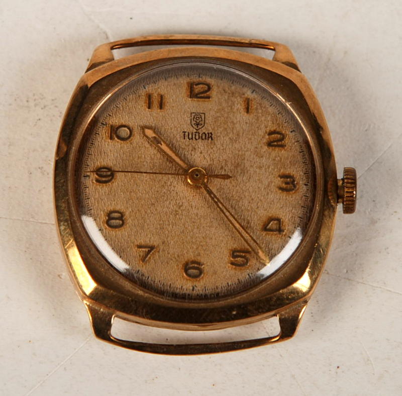 A Rolex Tudor 9ct. gold gentlemans square wrist watch with Tudor 15