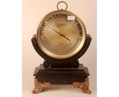 A giant brass cased aneroid barometer/thermometer, the silvered dial signed W.J. Hassard & Co., 209 Sauchiehall Street, Glasg