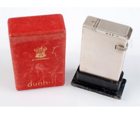 A Dunhill silver Broadboy petrol lighter Pat. No. 440072. London 1940. Original box. Condition Report: This item has some scr