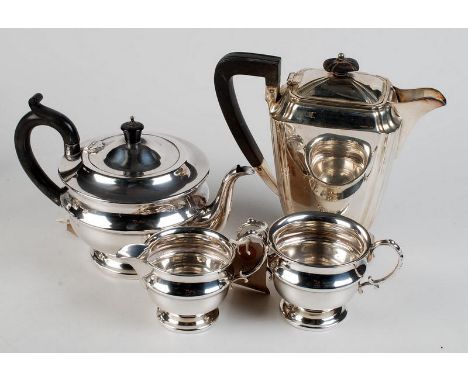 A three piece silver circular section tea service, by James Deakin & Sons, Birmingham, 1931, 21.4ozt.