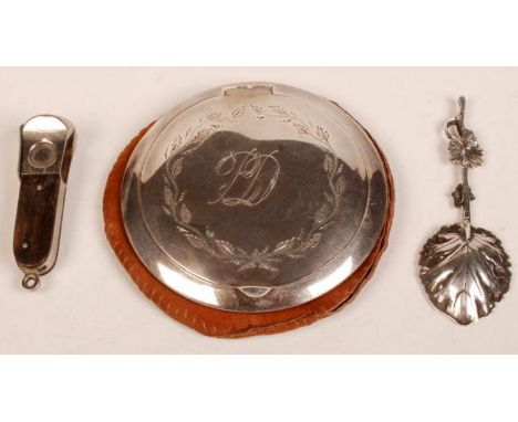 A Polish silver compact dated 1945, a small European leaf bowl caddy spoon and a cigar cutter.