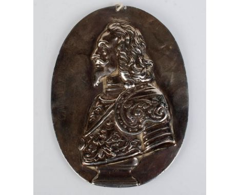 An apparently unrecorded silver portrait plaquette showing the bust of Charles I in profile looking left. He wears an histori