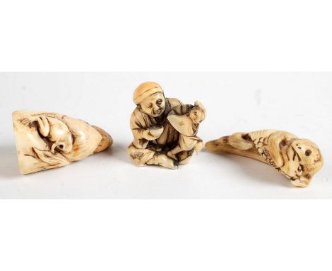 Three ivory netsuke. Condition Report: Missing piece on right of figures.
