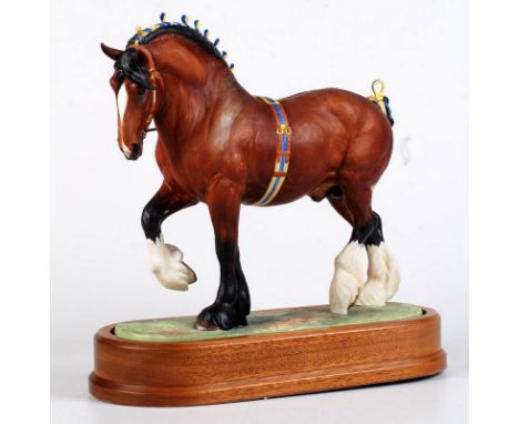 A Royal Worcester Shire stallion modelled by Doris Lindner. Width of base 27.5cm Condition Report: Good condition